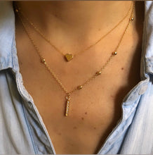 Cargar imagen en el visor de la galería, Baño de oro. Largo: Cadena, 40 cm con extensión ajustable de 5cm. Dije corazón de aprox, 0.5cm de ancho